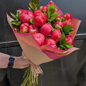 Simply Wrapped - Stems of Coral Charm Peonies in Brown Paper