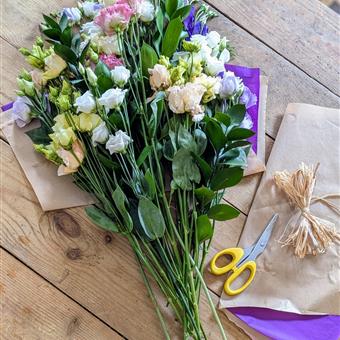 Simply Wrapped - Stems of Lisianthus in Brown Paper